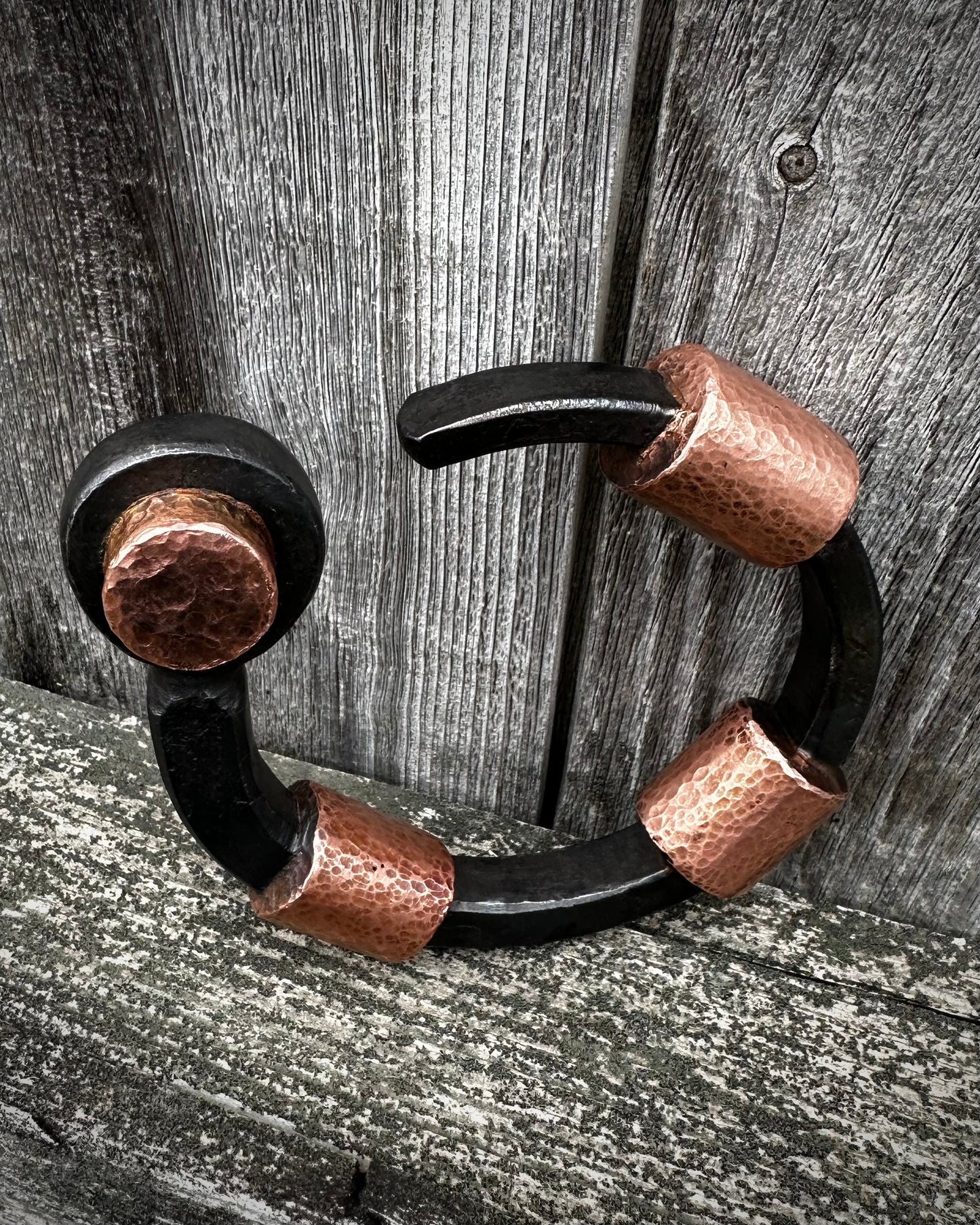 Forged steel, cast & hammered copper, with waxed hot finish