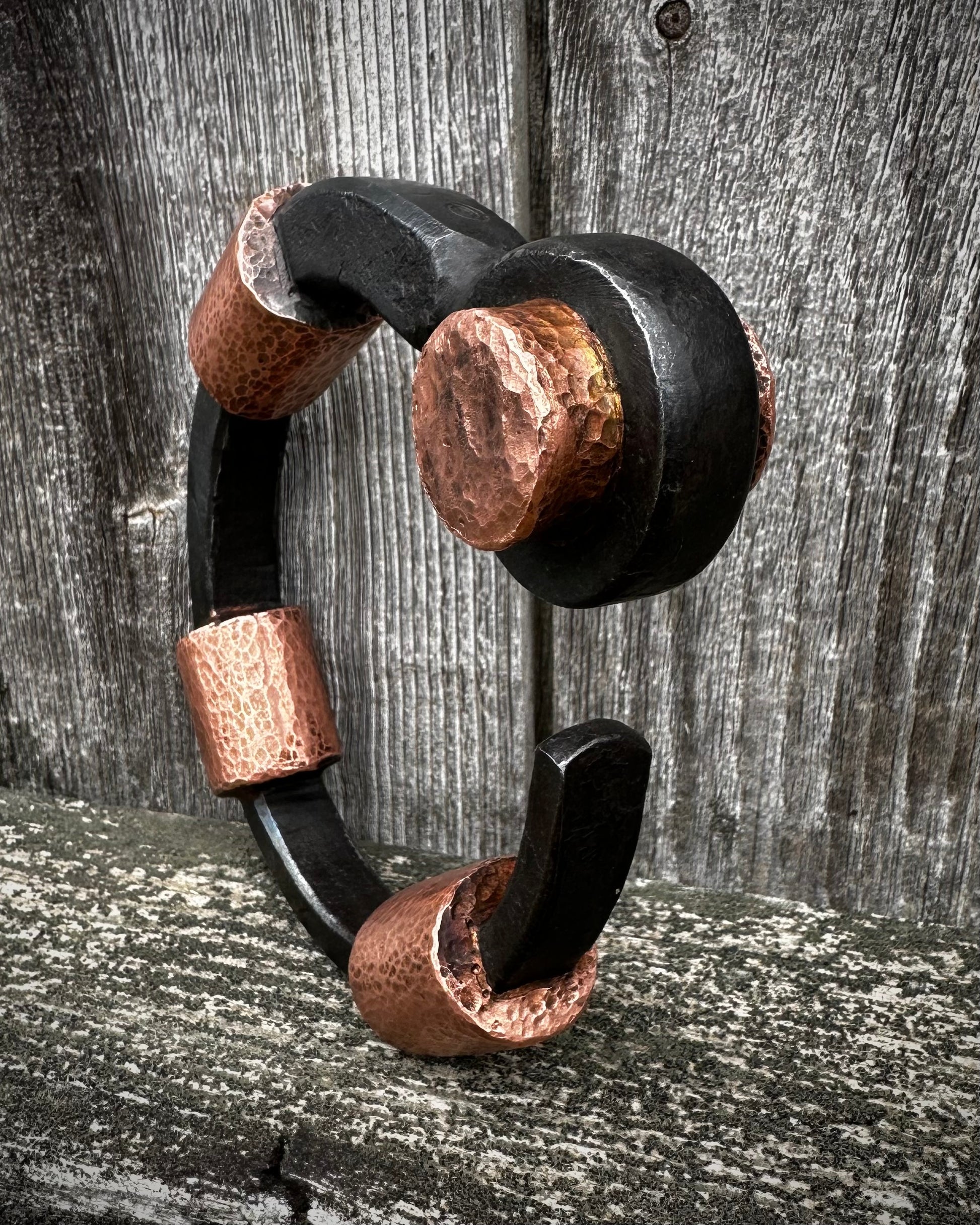 Forged steel, cast & hammered copper, with waxed hot finish