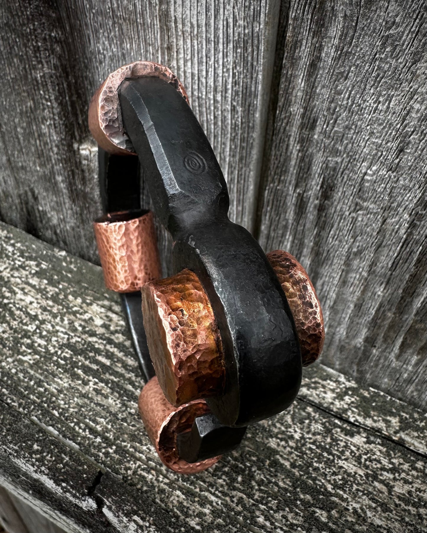 Forged steel, cast & hammered copper, with waxed hot finish