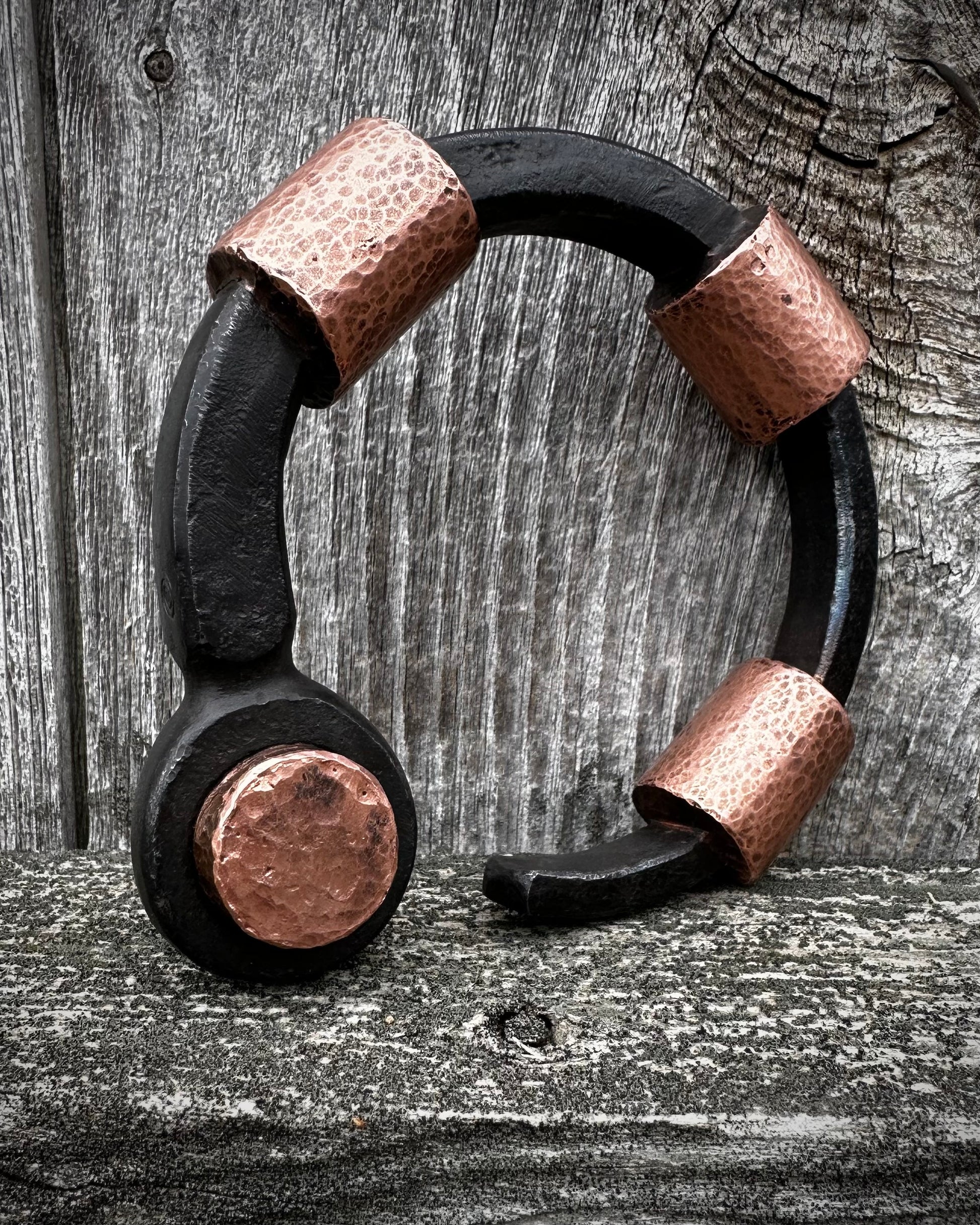 Forged steel, cast & hammered copper, with waxed hot finish