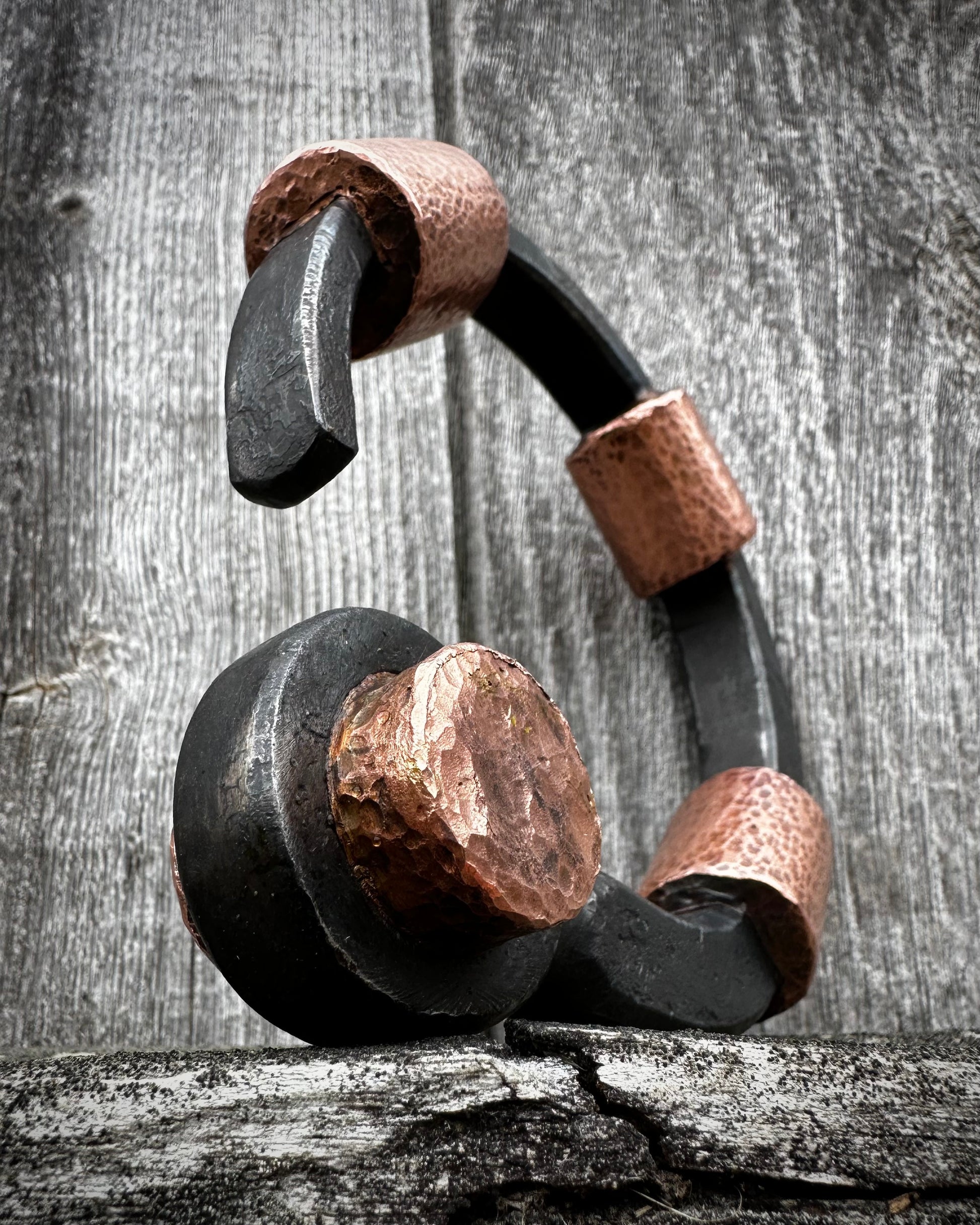 Forged steel, cast & hammered copper, with waxed hot finish