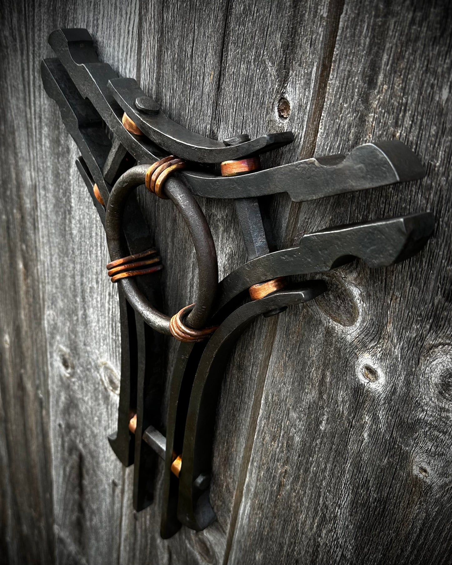 Forged steel & copper with waxed hot finish.