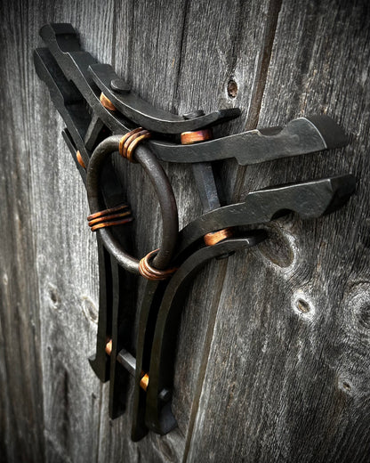 Forged steel & copper with waxed hot finish.