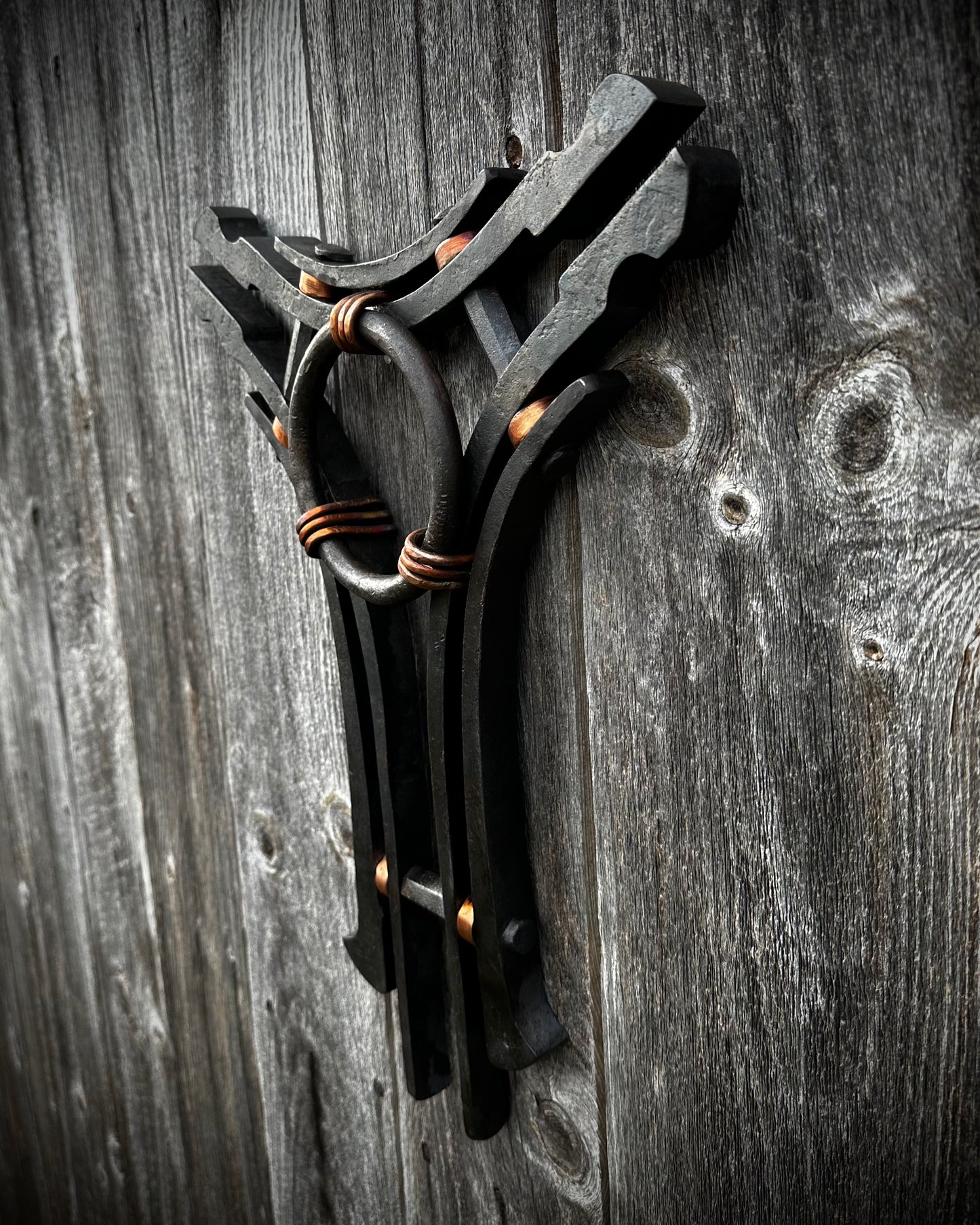 Forged steel & copper with waxed hot finish.