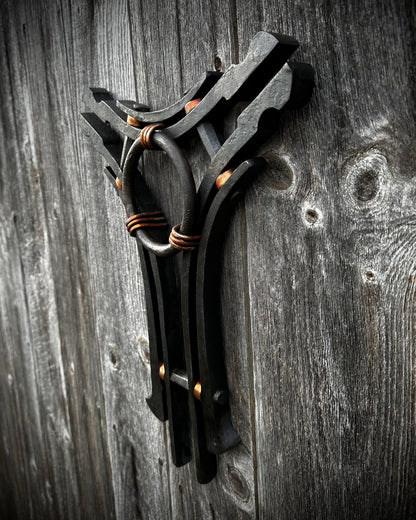 Forged steel & copper with waxed hot finish.