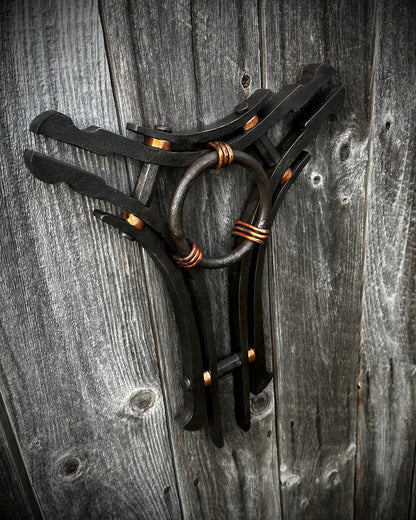 Forged steel & copper with waxed hot finish.
