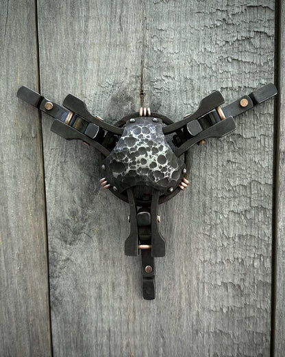 Forged steel & copper with waxed hot finish.