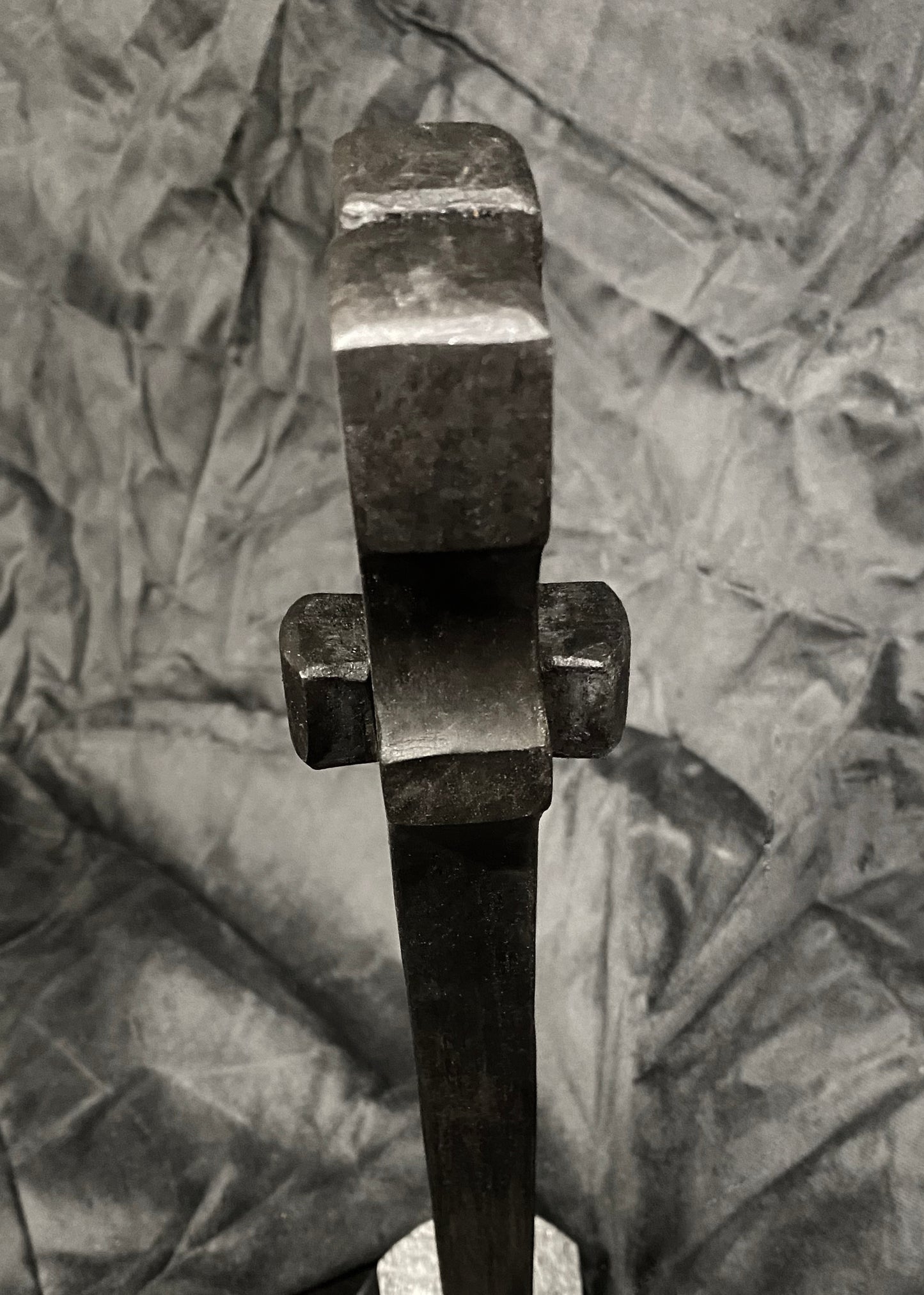 Forged steel with waxed hot finish.