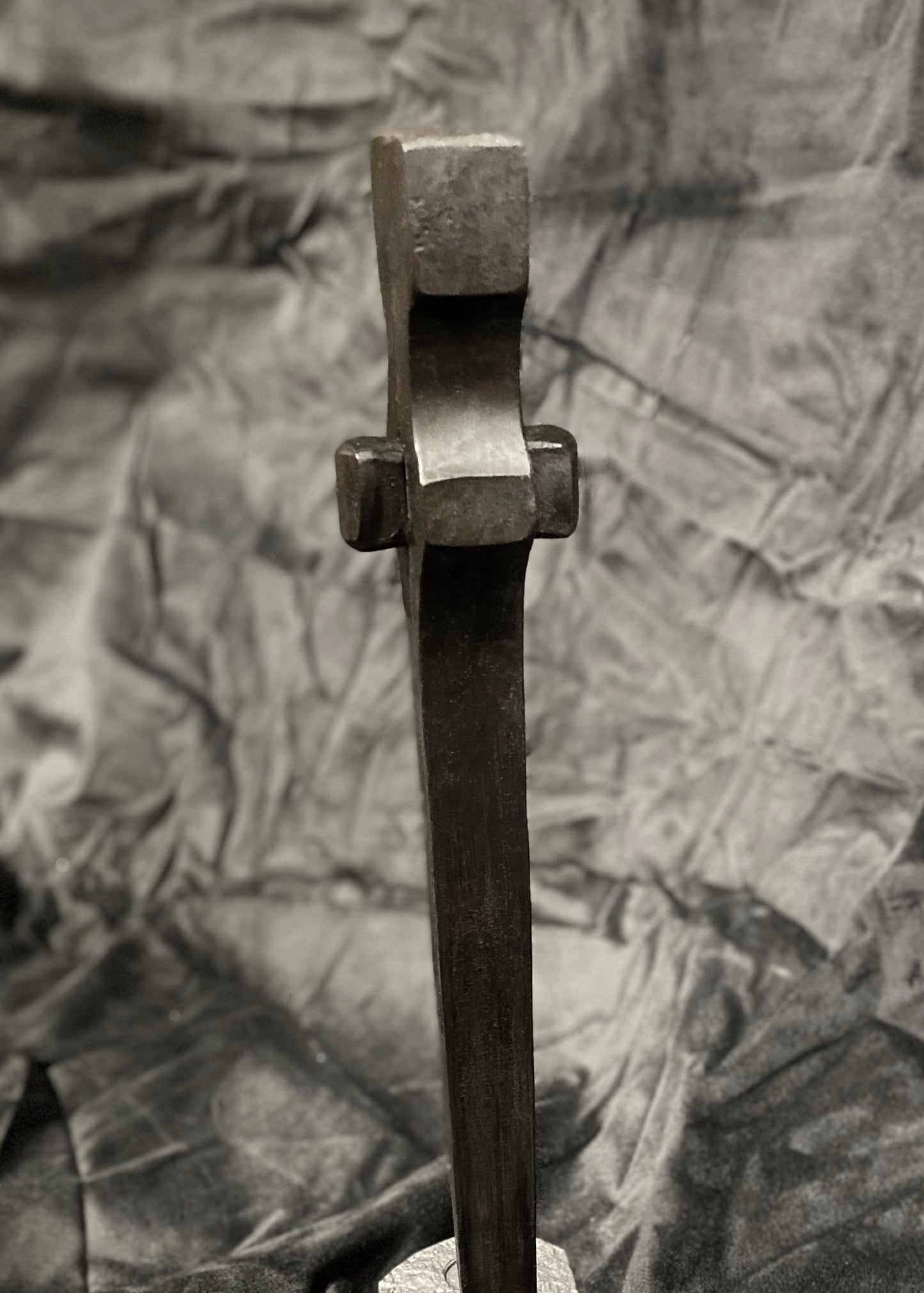 Forged steel with waxed hot finish.