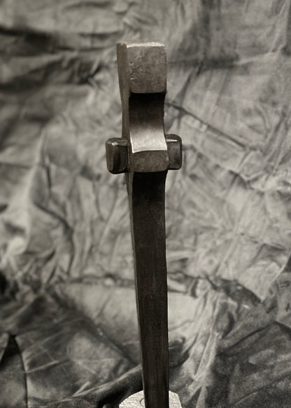 Forged steel with waxed hot finish.