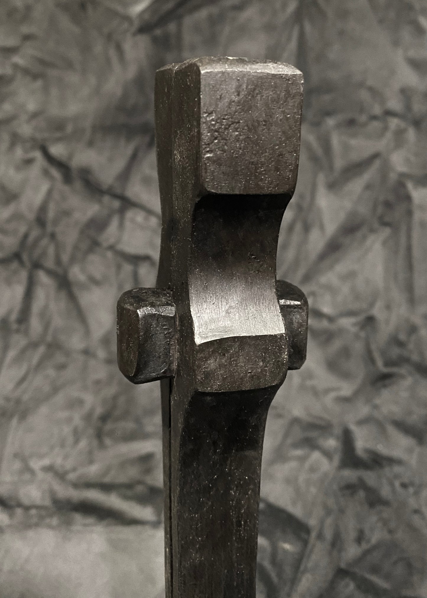 Forged steel with waxed hot finish.